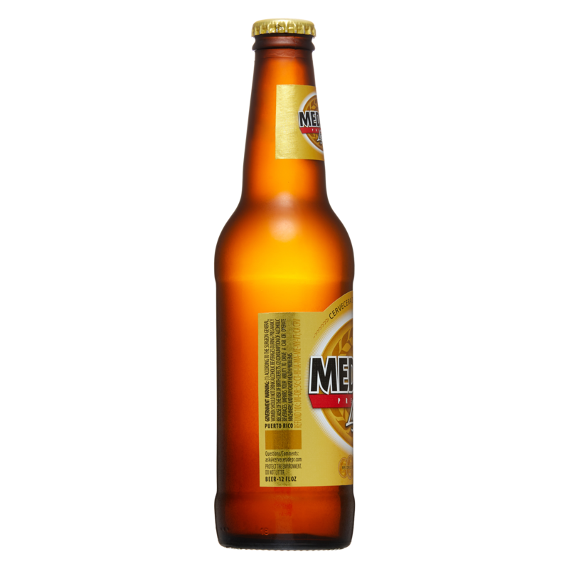Medalla Light 6pk 12oz Btl 4.0 ABV Alcohol fast delivery by App or Online